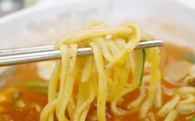 \"新吉洞辛いチャンポンの別カット（食神コンテンツチーム提供）\"