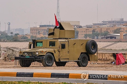 イラクのバグダッドに配備された装甲車ハンヴィー