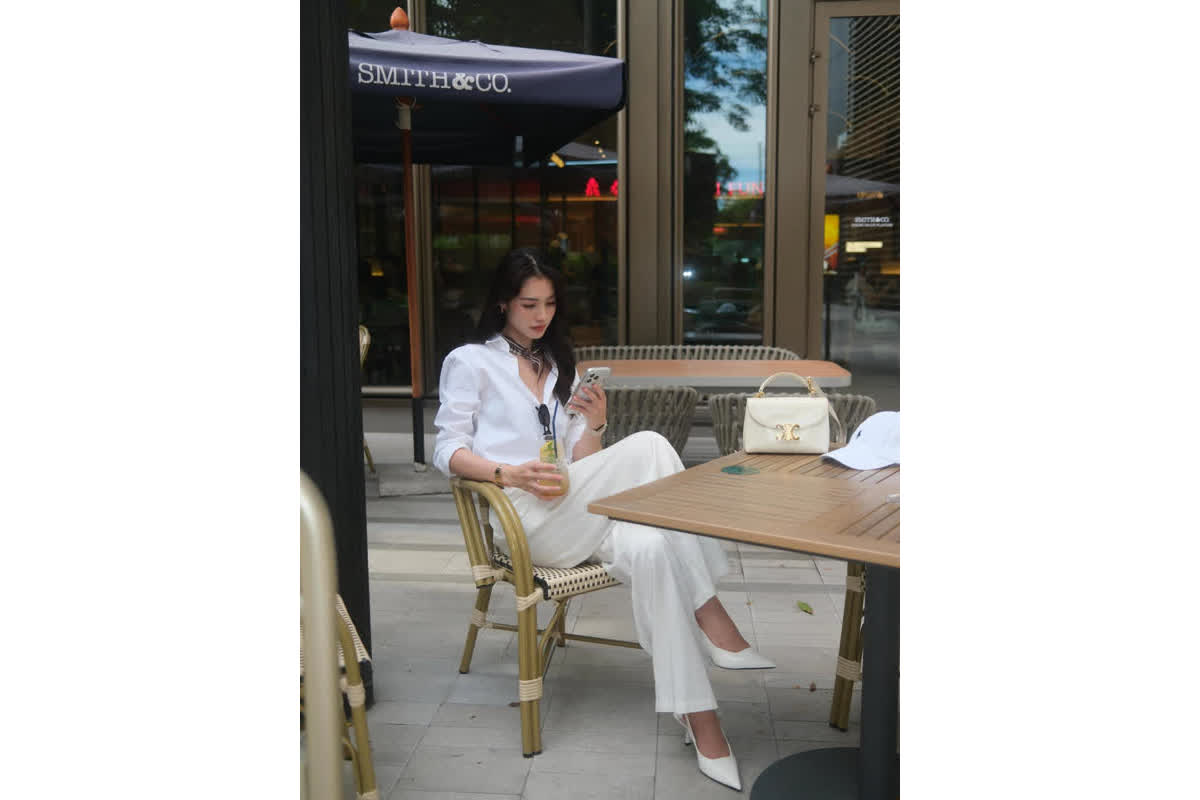 Spring Fashion Guide: How Thai Influencer Mintran Rocks the All-White Look with Wide Pants