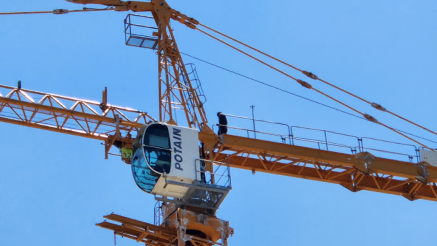 131 Feet in the Air: Why a Worker Is Occupying a Massive Crane in South Korea